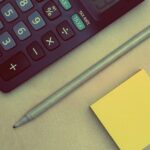 Immagine che illustra il calcolo delle tasse per partita IVA forfettaria in Italia.